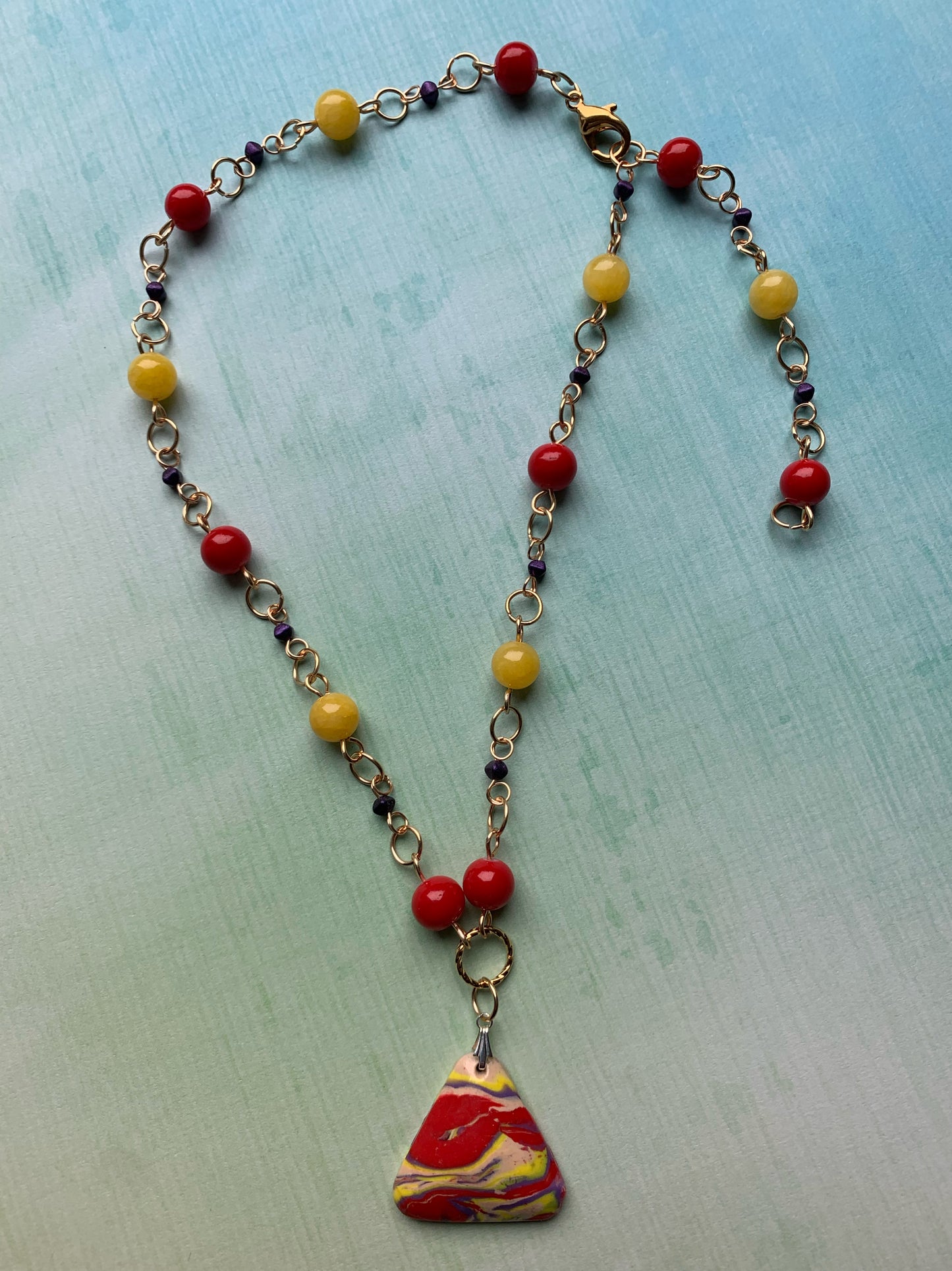 Purple, Red, and Yellow Czech Glass and Stone Bead Link Necklace with Handmade Polymer Clay Red, Yellow, and Purple Triangle Pendant