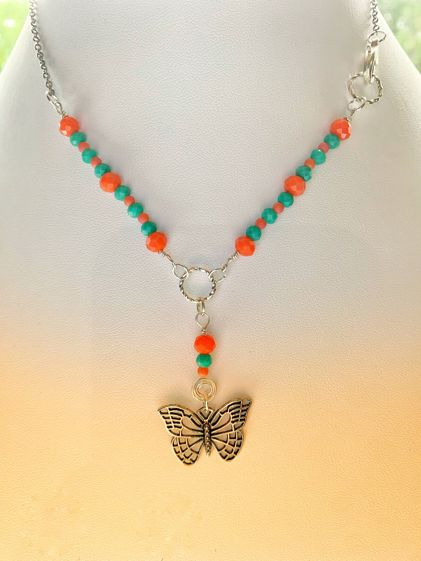Dainty Orange and Green Glass Rondelle Necklace with a Simple Antique Silver Metal Butterfly Charm Pendant