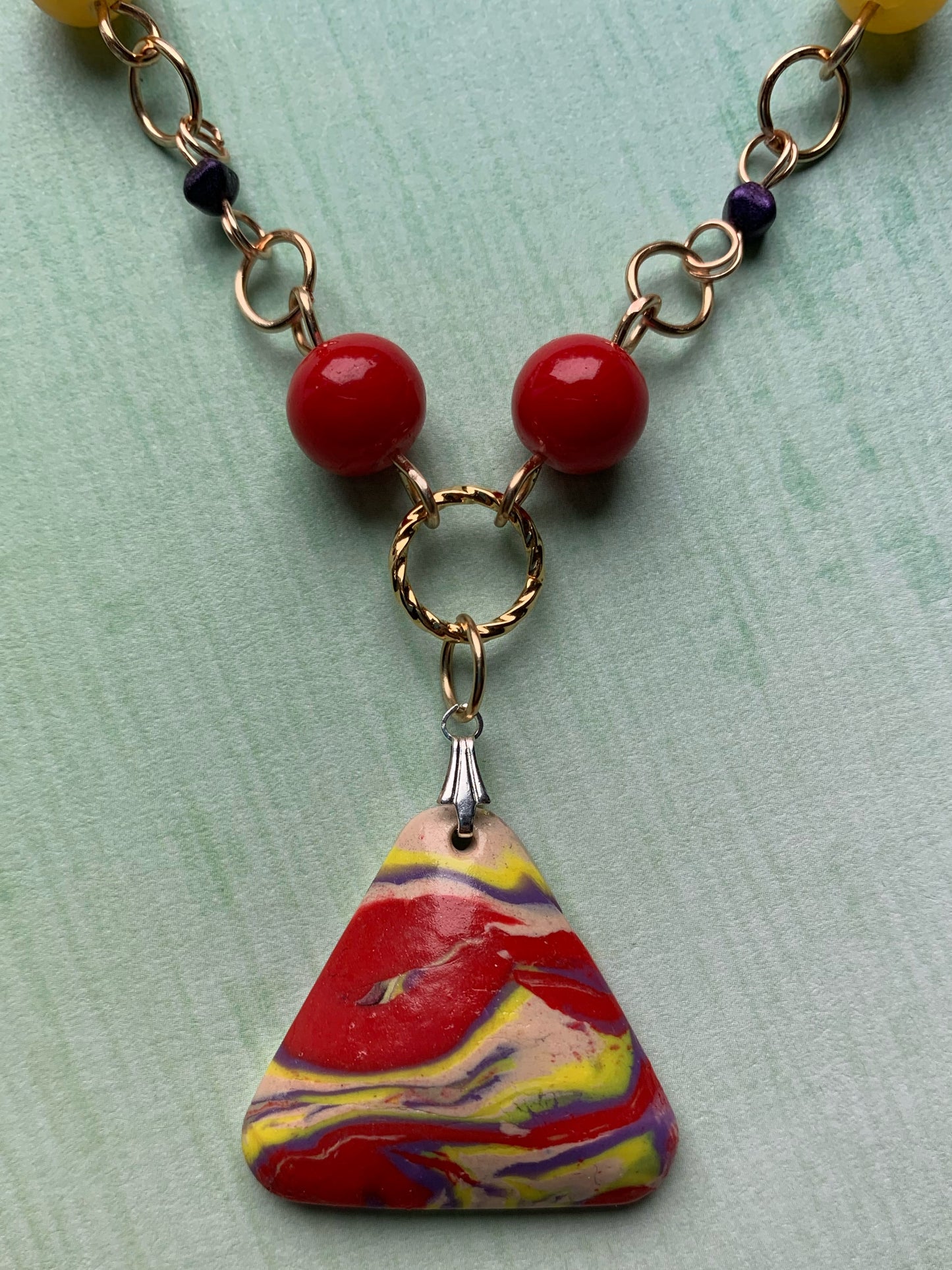Purple, Red, and Yellow Czech Glass and Stone Bead Link Necklace with Handmade Polymer Clay Red, Yellow, and Purple Triangle Pendant